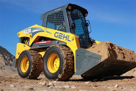 gehl vertical lift skid steer|who makes gehl skid steers.